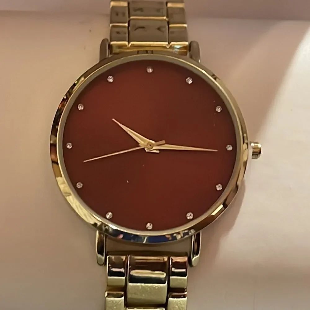 NWT INC International Concepts gold red dial watch